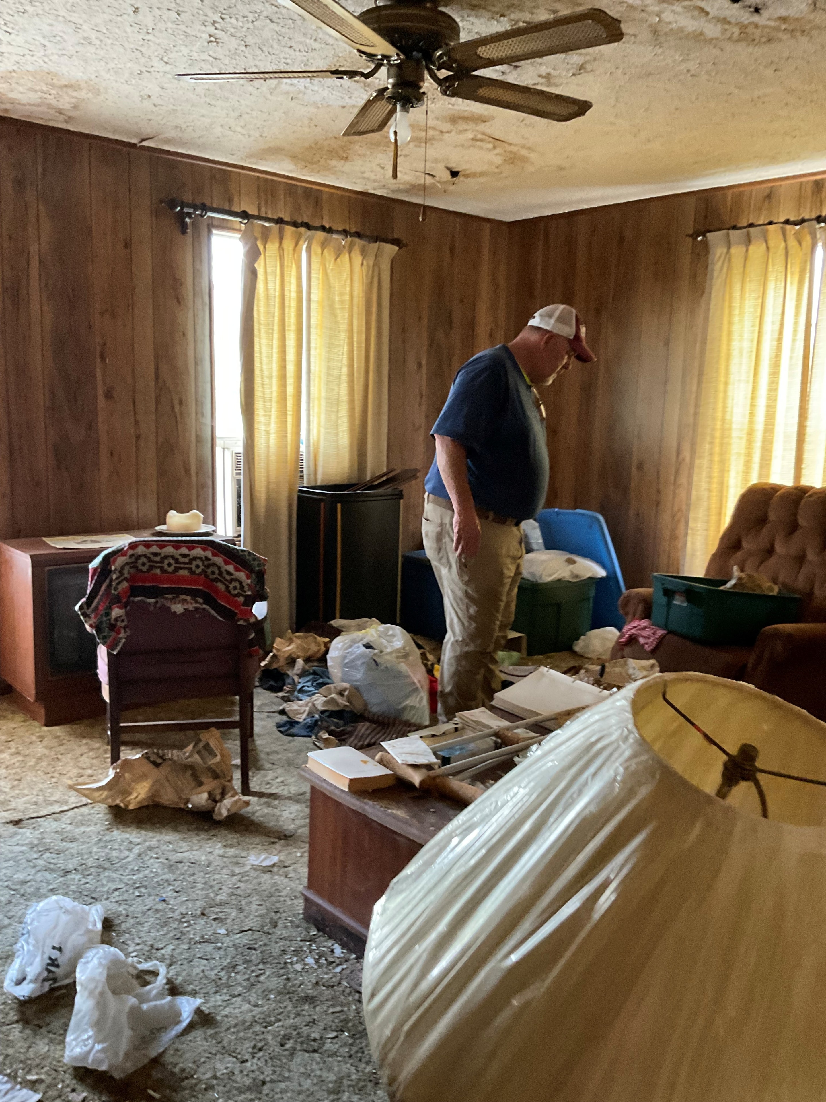 Junk-filled room before rescue